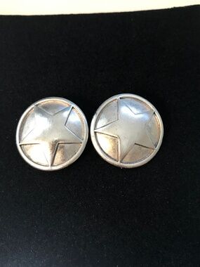 Vintage star clip earrings new never worn. Silver tone metal